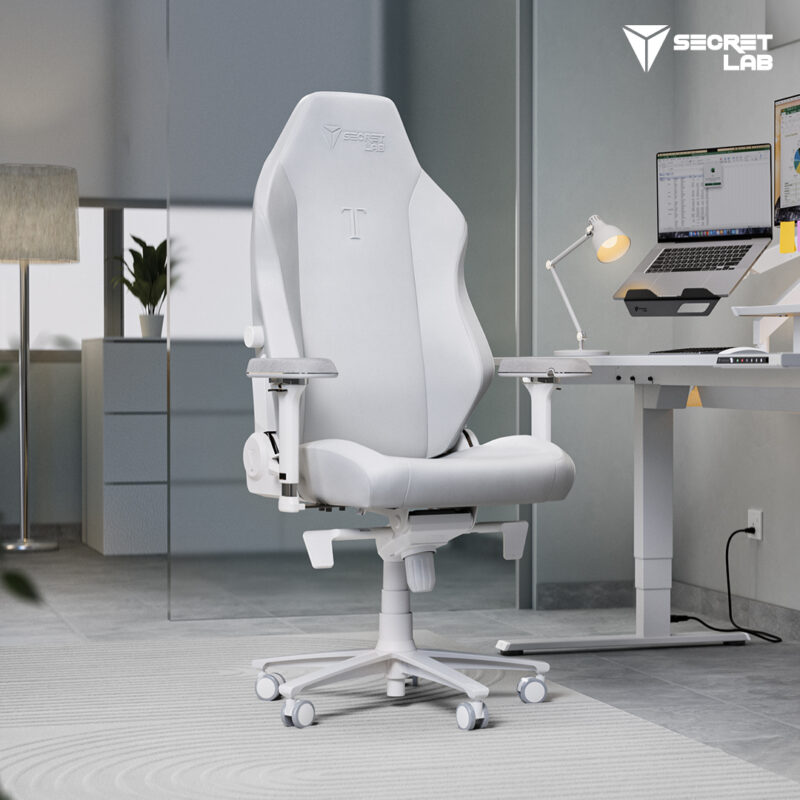 Secretlab Titan Evo NanoGen Edition gaming chair in a Pure White colorway as part of a complete desk setup